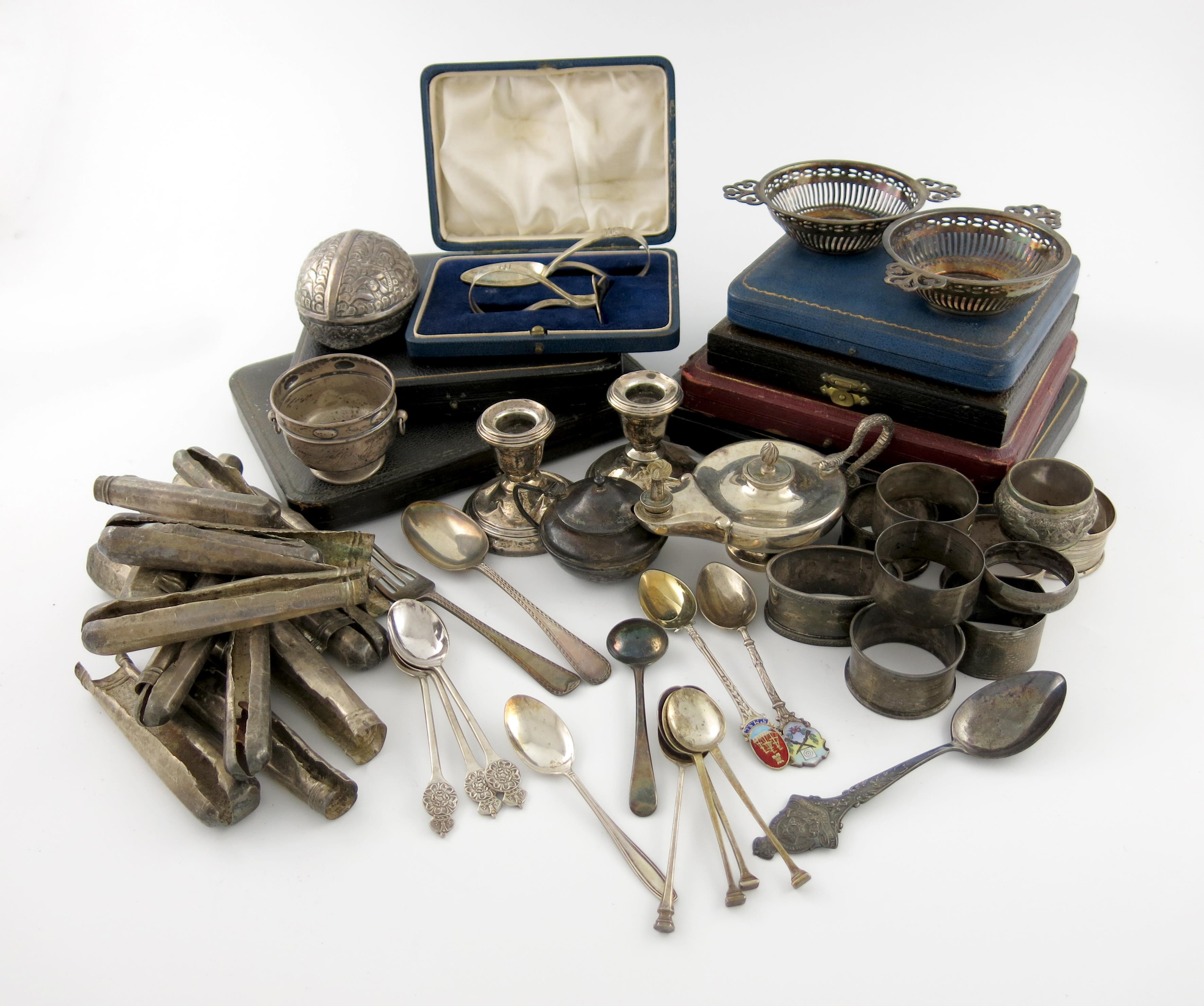 A mixed lot of silver items, various dates and makers, comprising: a table cigar lighter modelled as