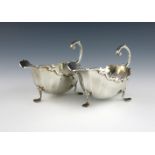 A pair of silver sauce boats, by S. Blanckensee and Sons, Chester 1917, oval fluted form, scroll