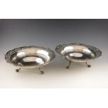 A pair of silver dishes, by C. Boyton and Sons, London 1922, circular form, pierced foliate scroll