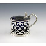 A Victorian silver mustard pot, by Frederick Fox, London 1853, circular form, pierced scroll