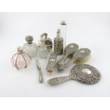 A mixed lot of silver items, various dates and makers, comprising: an Edwardian silver-mounted glass