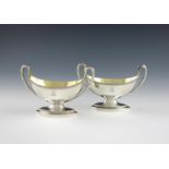 A pair of George III silver salt cellars, by Wakelin and Taylor, London 1784, oval form, fluted
