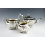 λ A three-piece Victorian silver tea set, by William Moulson, London 1846 and 1850, lobed tapering