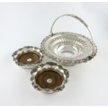 An early 19th century old Sheffield plated swing-handled basket, circa 1820, circular form, part-