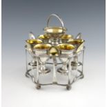A George III silver six egg cup cruet stand, by the Matthew Boulton, Birmingham 1809, shaped wire-