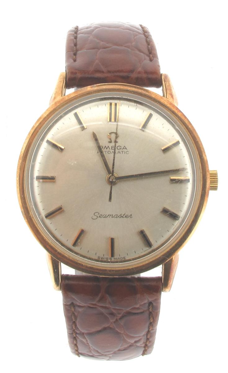 A gentleman's gold Omega Seamaster wristwatch, automatic winding the signed dial with baton numerals