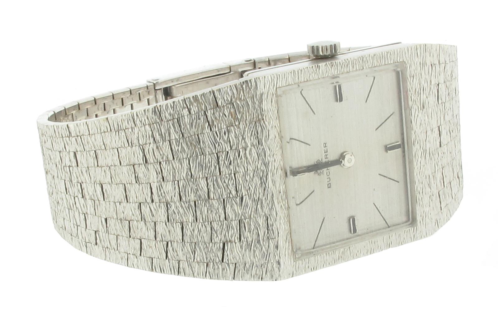 A lady's wristwatch by Bucherer, the signed square dial with baton numerals. 2cm wide. Manual