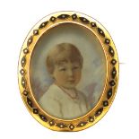 λ English School c. 1900 Miniature portrait of a girl, head and shoulders wearing a coral necklace