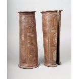 A pair of Igbo copper anklets Nigeria of tapering cylindrical form with ribbed panels flanking