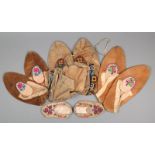 Four pairs of Ojibwe moccasins North America leather, with embroidered floral decoration, one pair