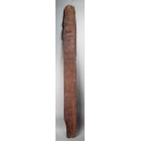 An Aborigine large churinga Australia wood, with incised linear and dot geometric decoration, the