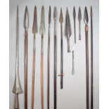 A collection of spears Mainly African with iron blades and wood shafts, with four loose blades,