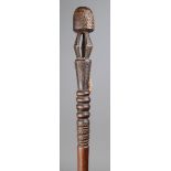 A Kukuruku staff Kabba Province, Nigeria wood, with a domed finial on three angled supports to a