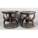 Two Igbo stools Nigeria carved wood, with circular bases and tops with similar linear decoration and