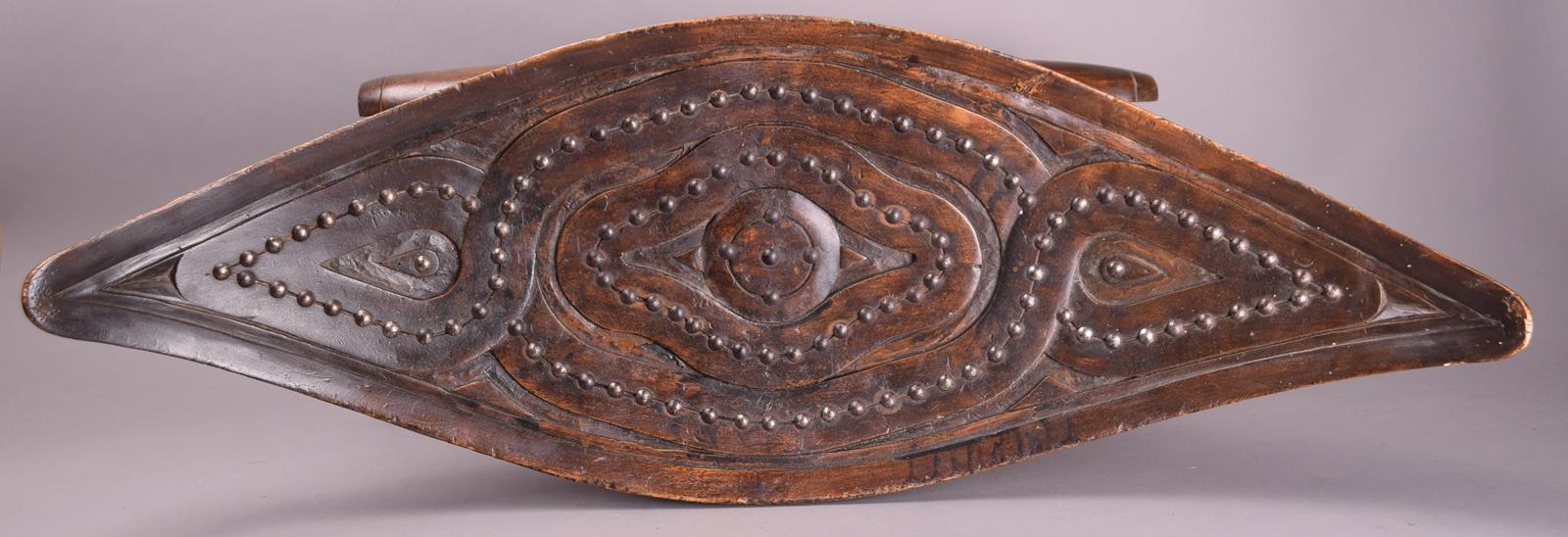 A Surinam Maroons stool South America wood, with metal stud decoration, with a curved eliptical - Image 3 of 4