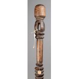 A Kukuruku staff Kabba Province, Nigeria wood, with a domed finial with carved decoration on an open