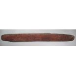 An Aborigine large churinga Australia wood, with incised line and dot decoration to the concave