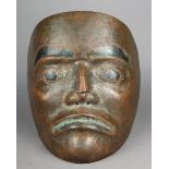 A North West Coast copper mask Possibly Haida / Tsimshian with burnished eyebrows and eyes, with