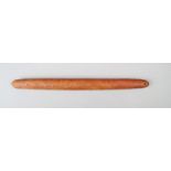 An Aborigine message stick Western Australia wood, with engraved concentric circles, lines and dots,