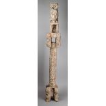 A Timor / Leti ancestor figure Indonesia wood, seated with a twin scroll cresting, on a raised