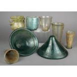 Eight glass vessels Roman and later including a pair of mastos type cups, a cylindrical beaker,