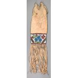 A Plains Indian pipe bag North America vellum, with foliage beadwork panels, bead edges, metal beads