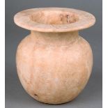 An Egyptian alabaster pot the ovoid body with a flat base and with a wide rim, 11.2cm high.