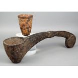 A Tibet ladle wood, with and encrusted patina, 43cm long, and a stitched animal skin conical sheath.