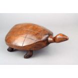 A Pitcairn Islands turtle Polynesia carved wood, with inlaid shell eyes, 26cm long.