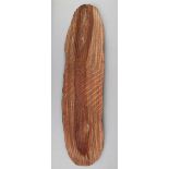 An Aborigine wunda shield Western Australia wood, with grooved zig-zag decoration and red and