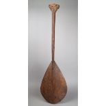 An Austral Islands dance paddle Polynesia carved wood, with suns, 'X's', crescents and chevrons,