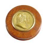 λ A 19th century French burr maple snuff box, the lid inset with a gilt bronze double portrait