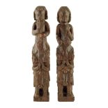 A pair of 17th century carved oak terms, one of a piper, the other of a drummer, 48.5cm high. (2)