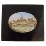 A late 19th century Italian micromosaic paperweight, with an oval panel depicting St Peter's Square,
