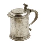 A Charles II pewter tankard, the hinged lid with owner's initials 'W S' over 'C W', with a