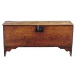 An elm boarded chest, with a vacant interior on later cut-out ends, late 17th / early 18th