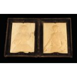λ A pair of 19th century French Dieppe craved ivory portrait plaques, of Louis XIII and Anne of