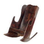 An early 19th century elm primitive child's lambing chair, on a rocking base, the reverse with a