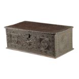 An early 18th century oak chip carved box, the hinged lid with heart and stylised flower designs,