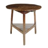 An elm cricket table, the circular triple boarded top on angular legs united by an undertier, late