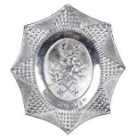 A silver livery belt plate, centre with stag's head pierced by two arrows over crossed keys within