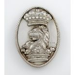 A George III silver livery badge, by Robert Garrard, London 1812, oval form, rope-work border, the