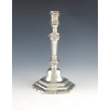 An 18th century French provincial silver candlestick, maker's mark MT, possibly for Michel