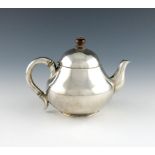 λ A late 19th century Indian Colonial silver teapot, by Hamilton and Co, Calcutta circa 1845,