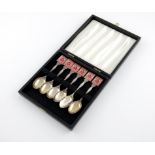 A set of six silver and enamel teaspoons, by Turner and Simpson, Birmingham 1930, the rectangular