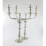 A pair of 19th century transitional Old Sheffield plated and electroplated three-light candelabra,