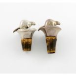 A pair of Victorian silver bottle stoppers, by J. Mackay, Edinburgh circa 1880, modelled as beavers,