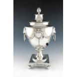 An early 19th century German silver tea urn, Kassel, date letter O, maker's mark I.K, urn form, with