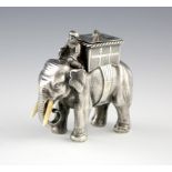 λ A Victorian novelty silver elephant table cigar lighter, by James Barclay Hennell, London 1879,