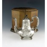 λ A 19th century French silver teapot, by Martial Fray, Paris circa 1850, baluster form, leaf capped